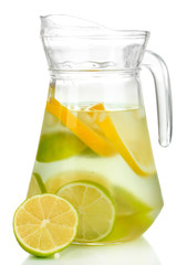 Cold water with lime, lemon and ice in pitcher isolated on
