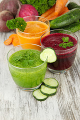 Fresh vegetable juices on table close-up