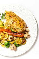Grilled chicken breasts and vegetables