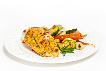 Grilled chicken breasts and vegetables