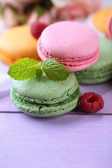 Gentle macaroons on table close-up