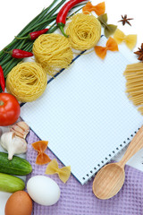 Cooking concept. Groceries with empty cookbook close up