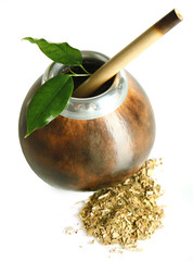 Calabash and bombilla with yerba mate isolated on white