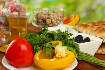 Traditional Turkish breakfast on table on bright background