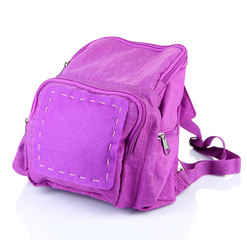 Purple backpack supplies isolated on white