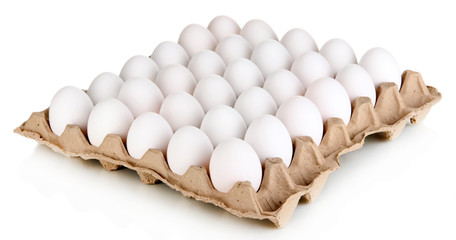 Eggs in paper tray isolated on white