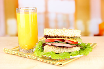 Fresh and tasty sandwich on plate on table on light background