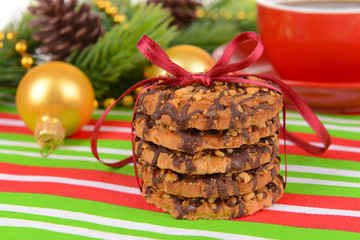 Sweet cookies with cup of tea on table close-up