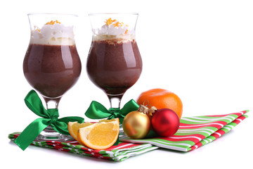 Tasty dessert with chocolate, cream and orange sauce, isolated