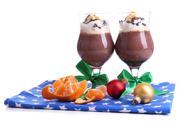 Tasty dessert with chocolate, cream and orange sauce, isolated