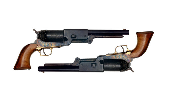 two identical old metal colt