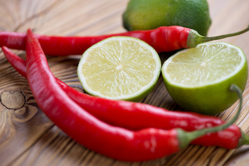 Close-up of essential thai flavours of chili and lime © Nickola_Che