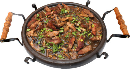 Traditional food with pork and chicken meat grilled on plate