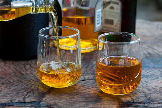 Golden Brown Whisky on the rocks in a glass