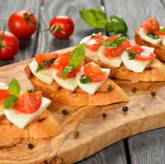 Bruschetta with mozzarella and tomatoes