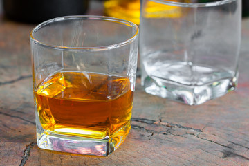 Golden Brown Whisky on the rocks in a glass
