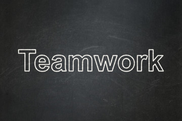 Business concept: Teamwork on chalkboard background