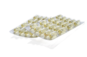 Fototapeta na wymiar fish oil capsules in blister pack isolated on white background