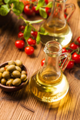 Obraz na płótnie Canvas Composition of olive oils in bottles