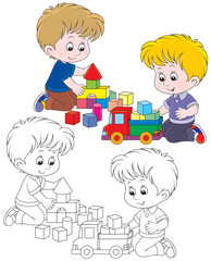 boys playing with a toy truck and bricks