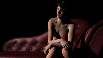 beautiful girl posing in red bikini on a sofa