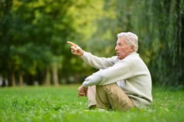 Naklejka na ściany i meble Elderly man in park