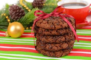 Sweet cookies with cup of tea on table close-up