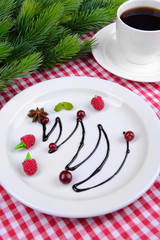 Christmas tree from chocolate on plate close-up