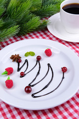 Christmas tree from chocolate on plate close-up