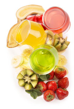 banana jelly, kiwi and strawberry on a white background