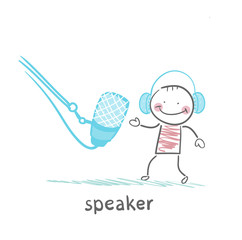 speaker in headphones speaks into a microphone