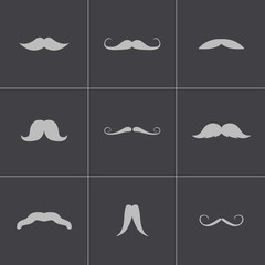 Vector black mustaches icons set