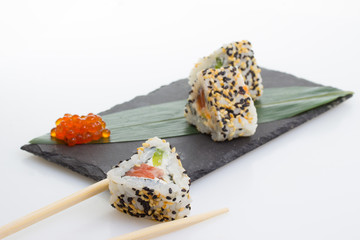 Sushi roll with sesame