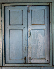 Old window with blue