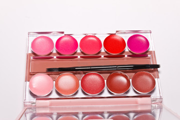 cosmetics on white paper