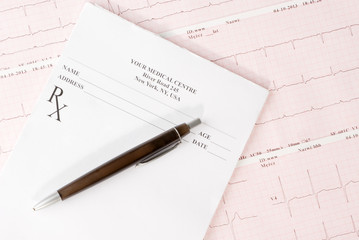 Empty medical prescription on electrocardiogram (ECG) chart