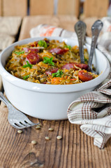 Cabbage stew with lentils and sausages