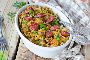 Cabbage stew with lentils and sausages