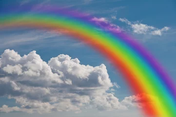 Foto op Plexiglas rainbow in the clouds. © Garoth