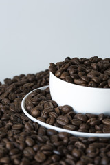 A cup of coffe on coffe beans