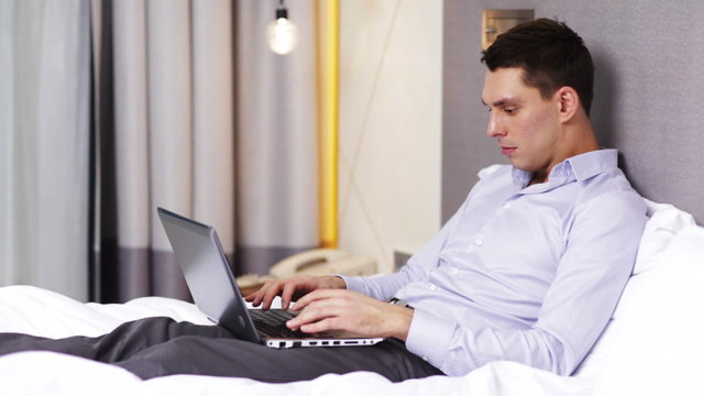businessman working with laptop computer in hotel