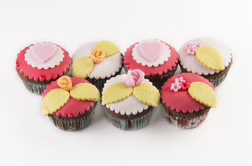 Five  cupcakes isolated on white background