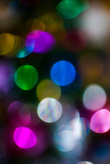 glasses with defocused christmas tree in background