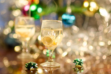 cndle in form of wine glass with seashells