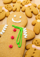 Traditional gingerbread cookies on wooden background
