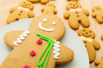 Fototapeta na wymiar Traditional gingerbread cookies on wooden background