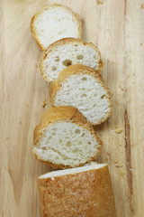 Baguette on wood board