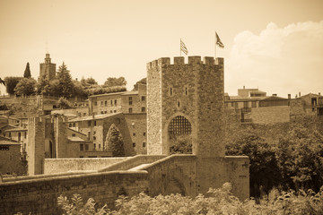 Medieval bridge with gate tower. Imitation of old image