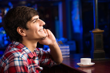 young man at the bar