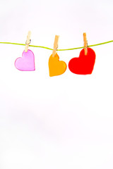 Two color hearts on the line